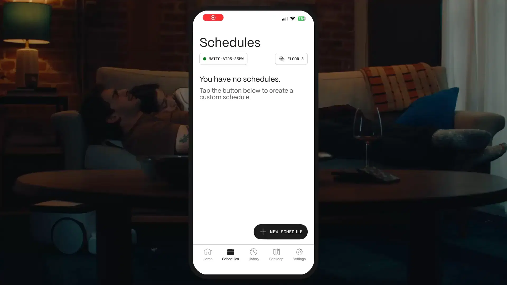 A hand holding a phone with Matic's cleaning schedule on screen