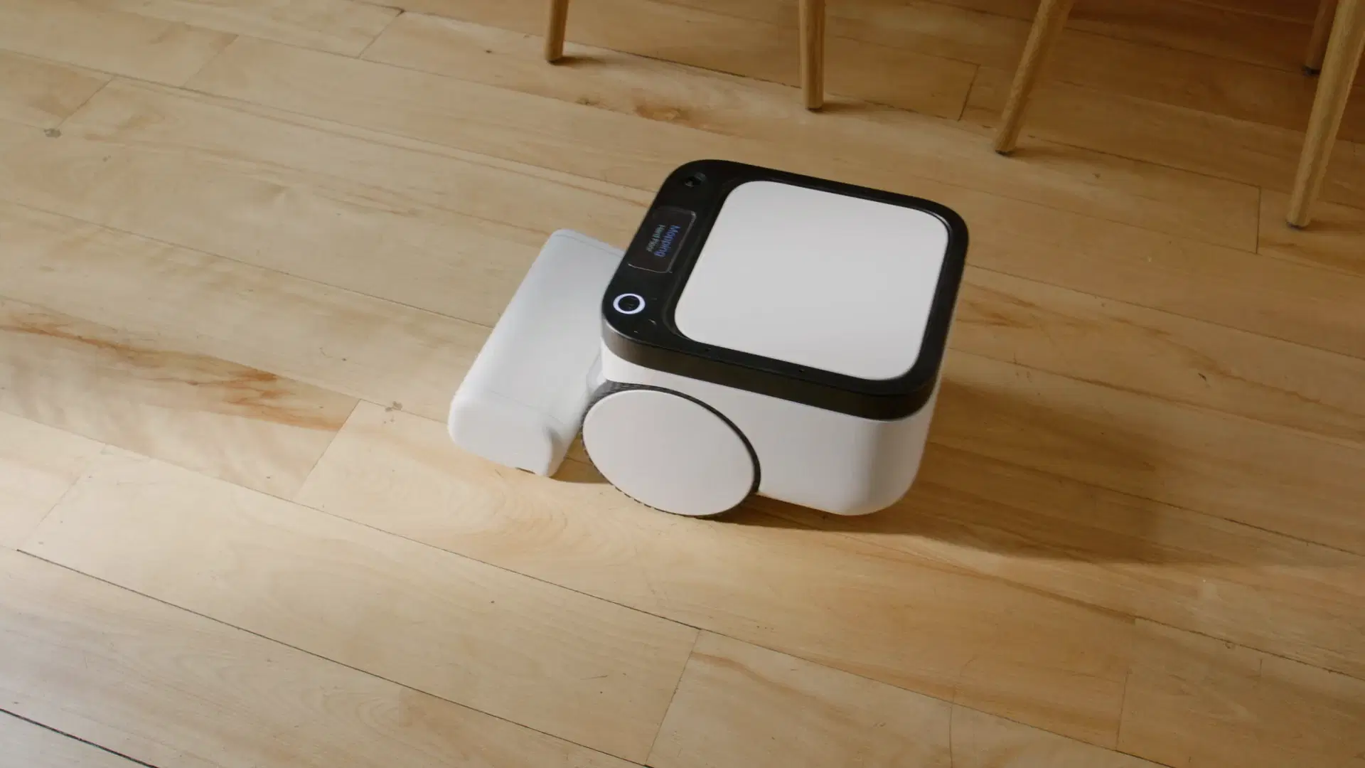 Matic spot-cleaning a patch of dirt on the floor