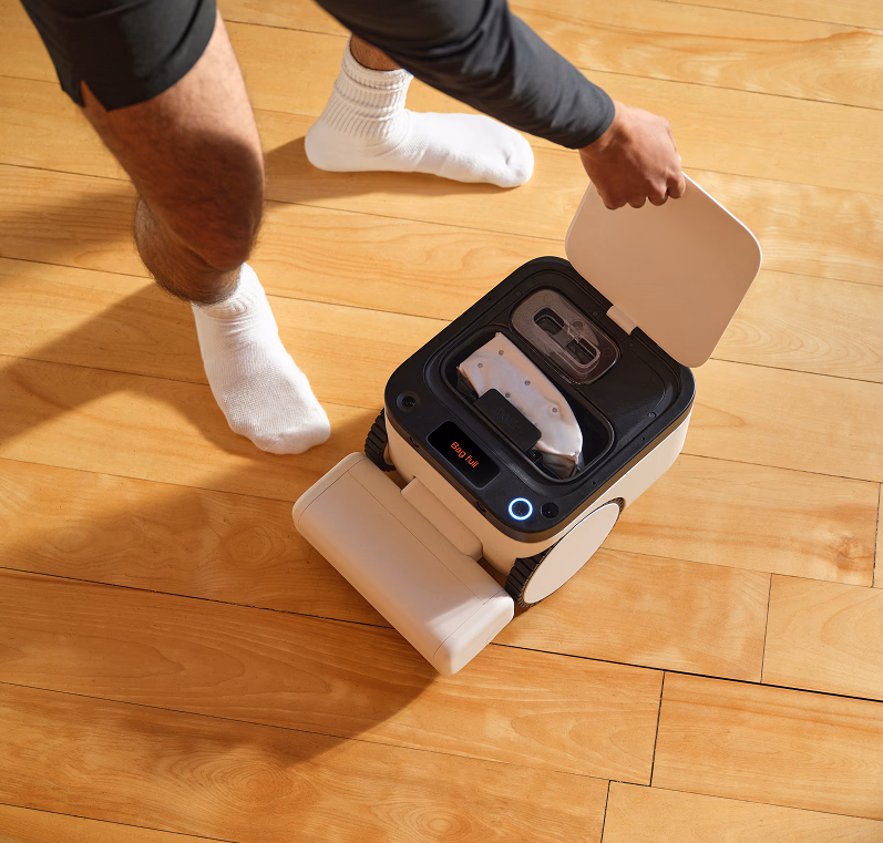 Matic with its lid open for waste disposal